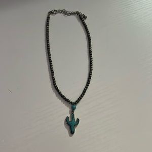 Cactus necklace, from a boutique, nevermore.